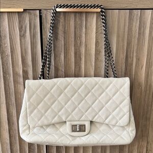 Chanel 2.55 Reissue Single Flap Bag Quilted Caviar 228